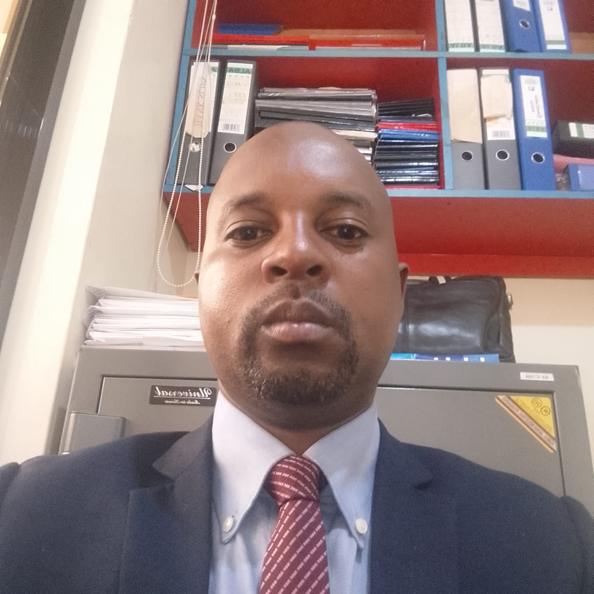Kujuna Alexander, School Director